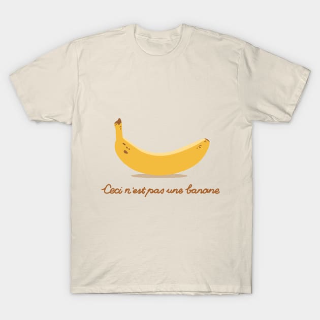 Ceci n'est pas une banane. T-Shirt by Chigurena